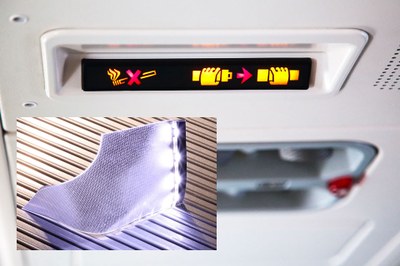 An airplane cabinet light is just one application example for Lumex's Shapable Backlight technology (small inset)