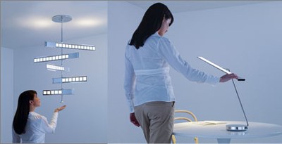 Philips (OLED Chandelier and OLED Tabletop) presenting four different concepts: standing, wall-mounted, desk-top and ceiling luminaires