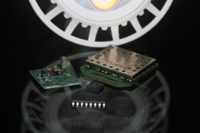 smarteXite LED driver IC (in the middle), Bluetooth device, RECT device and a standard IC package in front