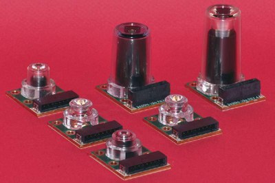 Figure 1: LumiBright LE line of light engines for commercial applications and incorporating high efficiency primary optics, photosensor, and thermistor on a high thermal conductivity metal core PCB in one package.