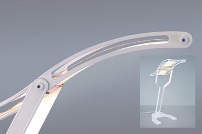 The R2Flex desk luminaire demonstrator (inset) is built of the curved flexible OLED on metal substrate