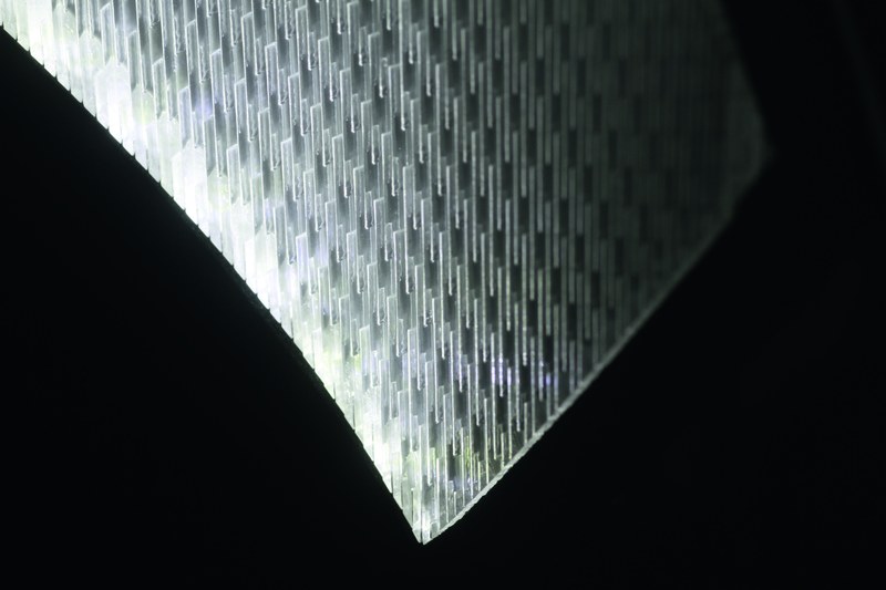 Flexible edge-lit LED solutions are allowed by using different approaches like this laser-cut acrylic light guide